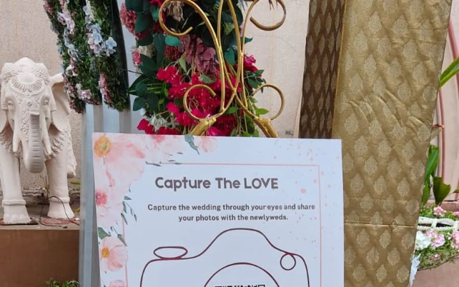 QR code sign at an event, the entry point to the photo sharing system